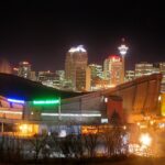 The saddledome and the skyline at night - Calgary